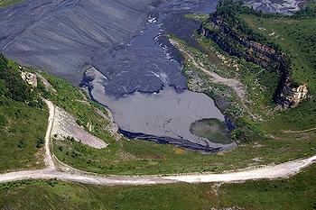 Sludge dam near mountaintop removal coal mining site in Logan County, West Virginia