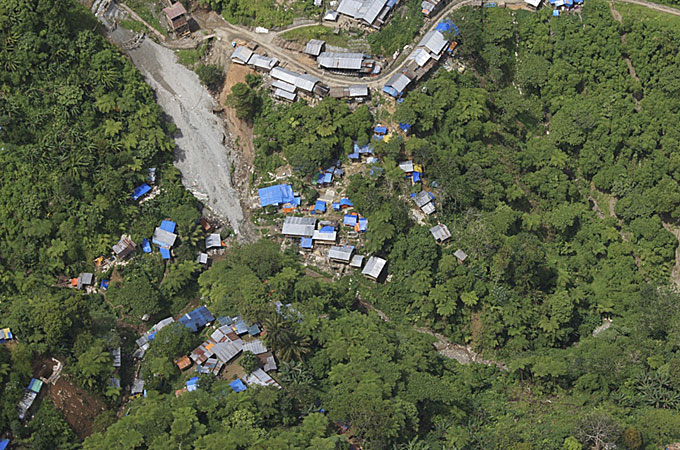An aerial view of a shanty town buried by a landslide in a mining area in Kingking village of Pantukan town