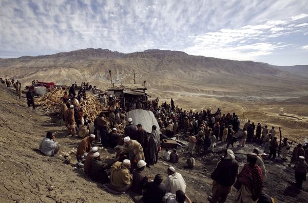 Residents And Rescue Workers Gather At The Entrance Of A Coal Mine In Quetta