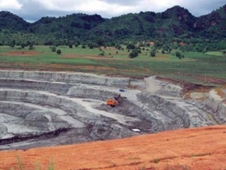 Digger works on the Tigyit mine in Shan state