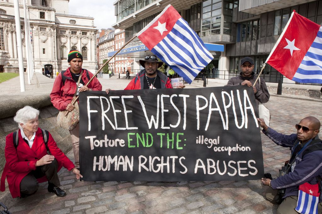 West Papuan activists protest outside Rio Tinto’s AGM over the company’s involvement in the Grasberg mine. Photo: Amy Scaife