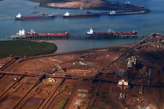 Boats waiting to load iron ore at Port Hedland, Australia
